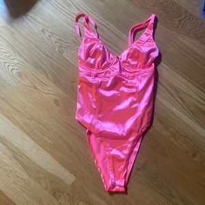 pink body suit